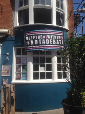 Brighton pub with 'no debate' banner