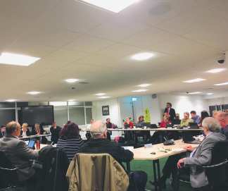 Council leader Peter Chowney speaks to the motion