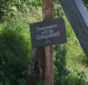 Garden sign: trespassers will be composted