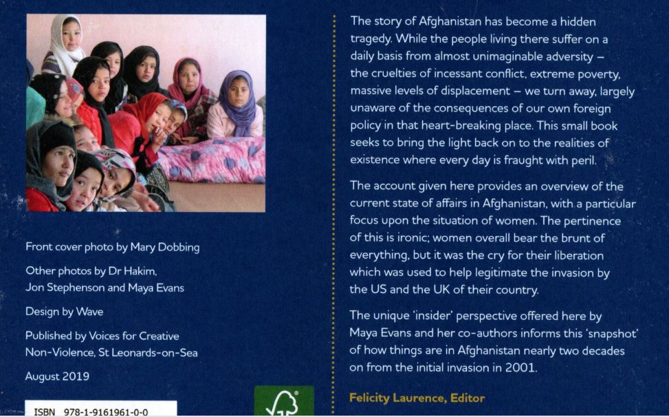 back of the book - with photo of a group of women and children