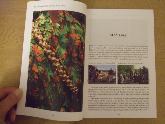 Page from the book showing photos of the rally and the text, the story of May Day