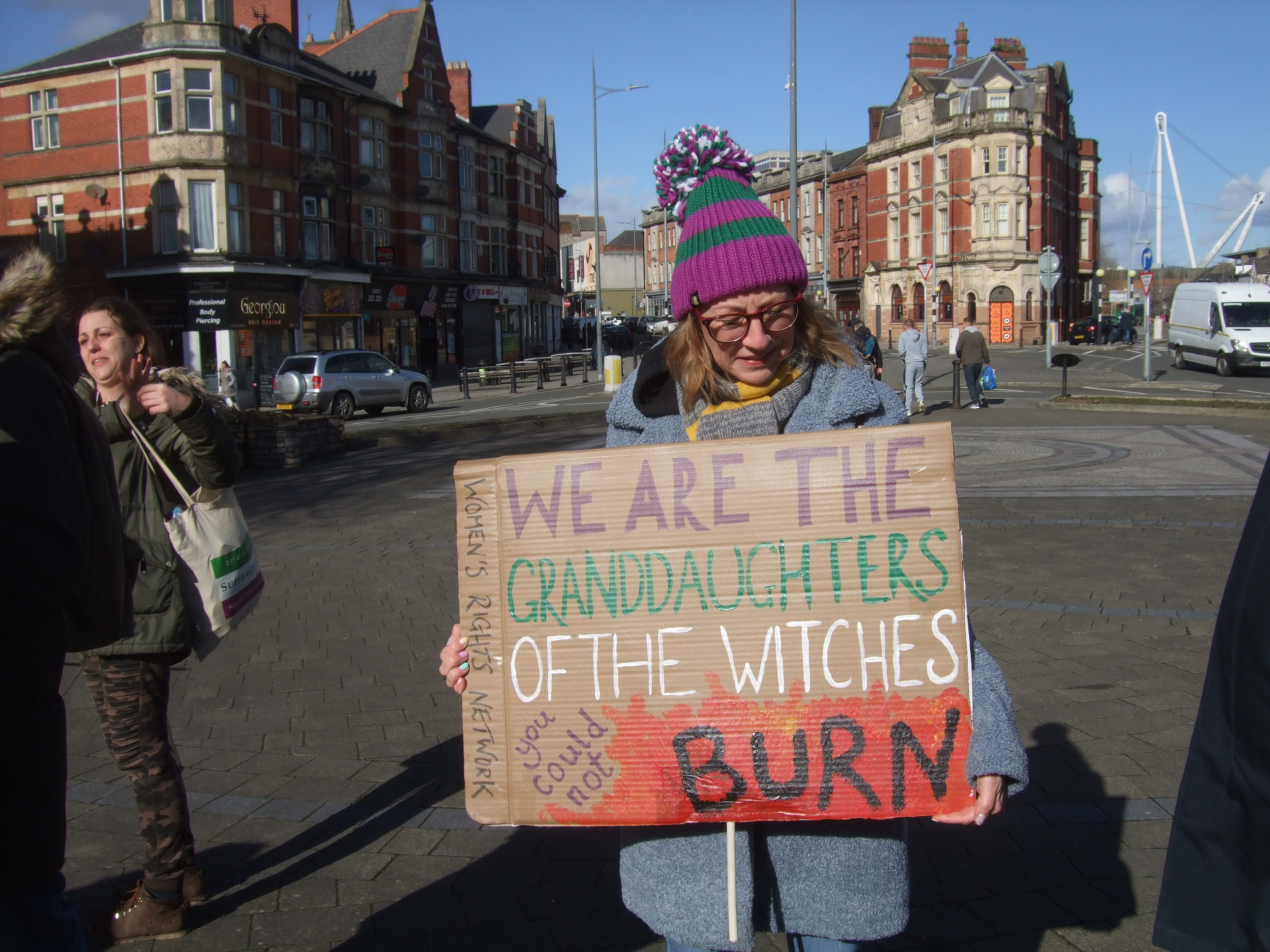 Newport banners: The Granddaughters of the Witches you could not burn