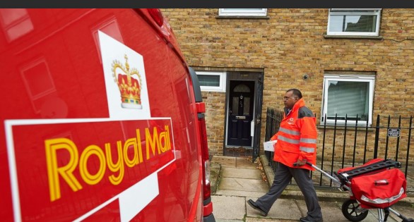 Royal Mail van and postal worker