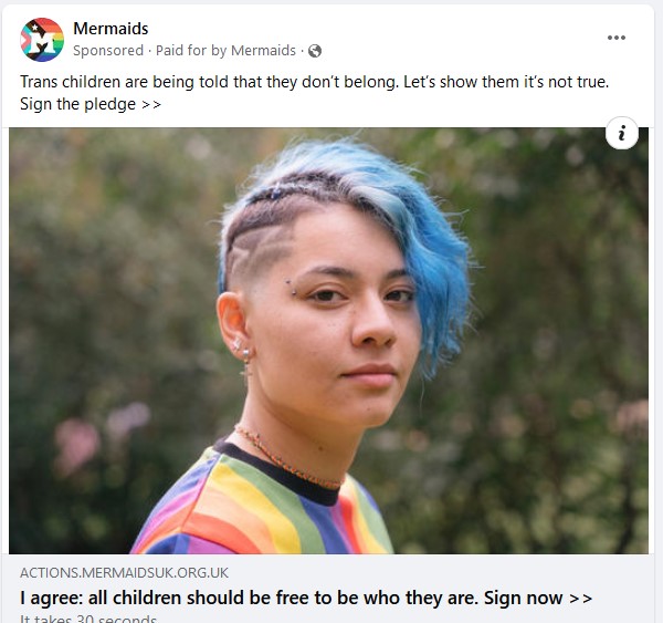 Young person with piercings and coloured hair.