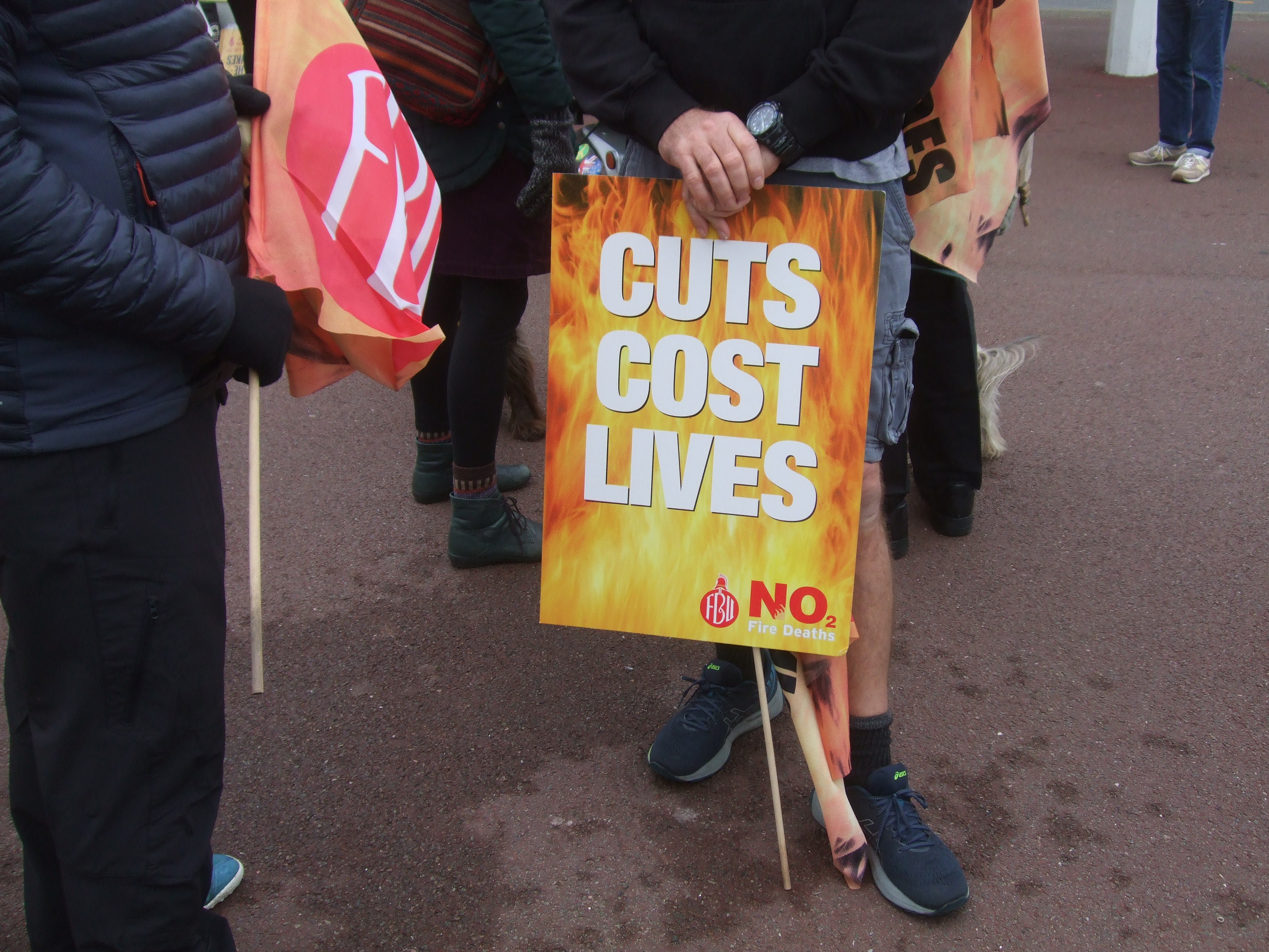 Cuts Cost Lives FBU placard