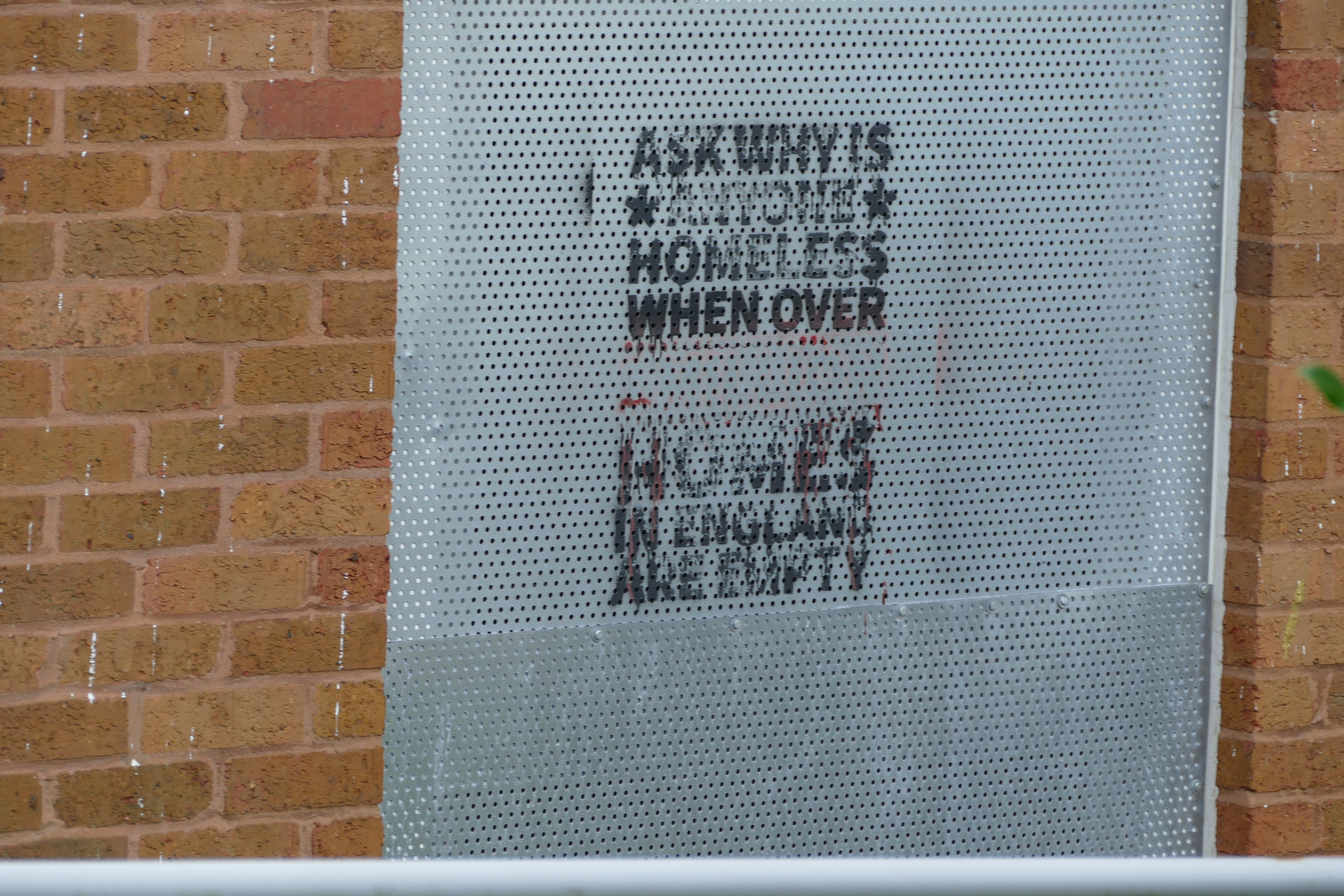 Clifton Court stensils - ask why is anyone homeless when homes are empty